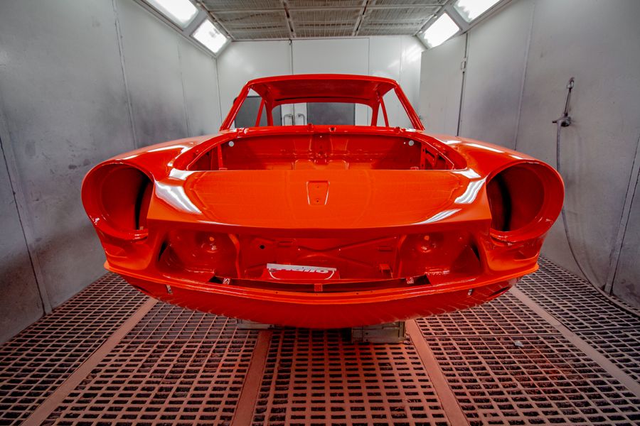 Freshly sprayed vehicle body in a professional paint booth