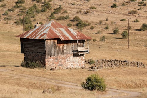 Foto profissional grátis de abandonado, área, barraca