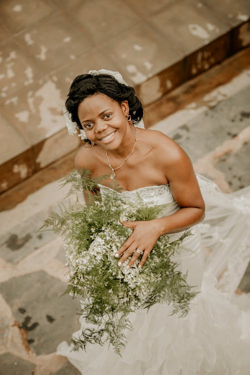 Bride Posing with a Flower Bouquet