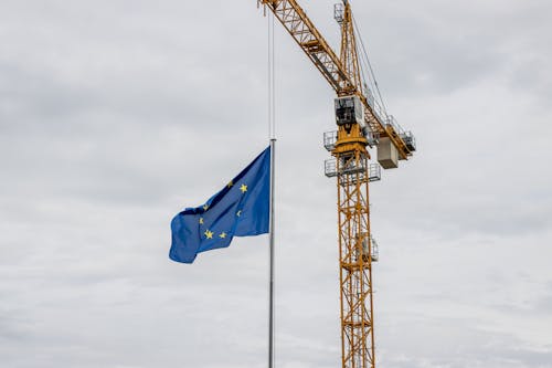 Photos gratuites de drapeau, grue de construction, réparer