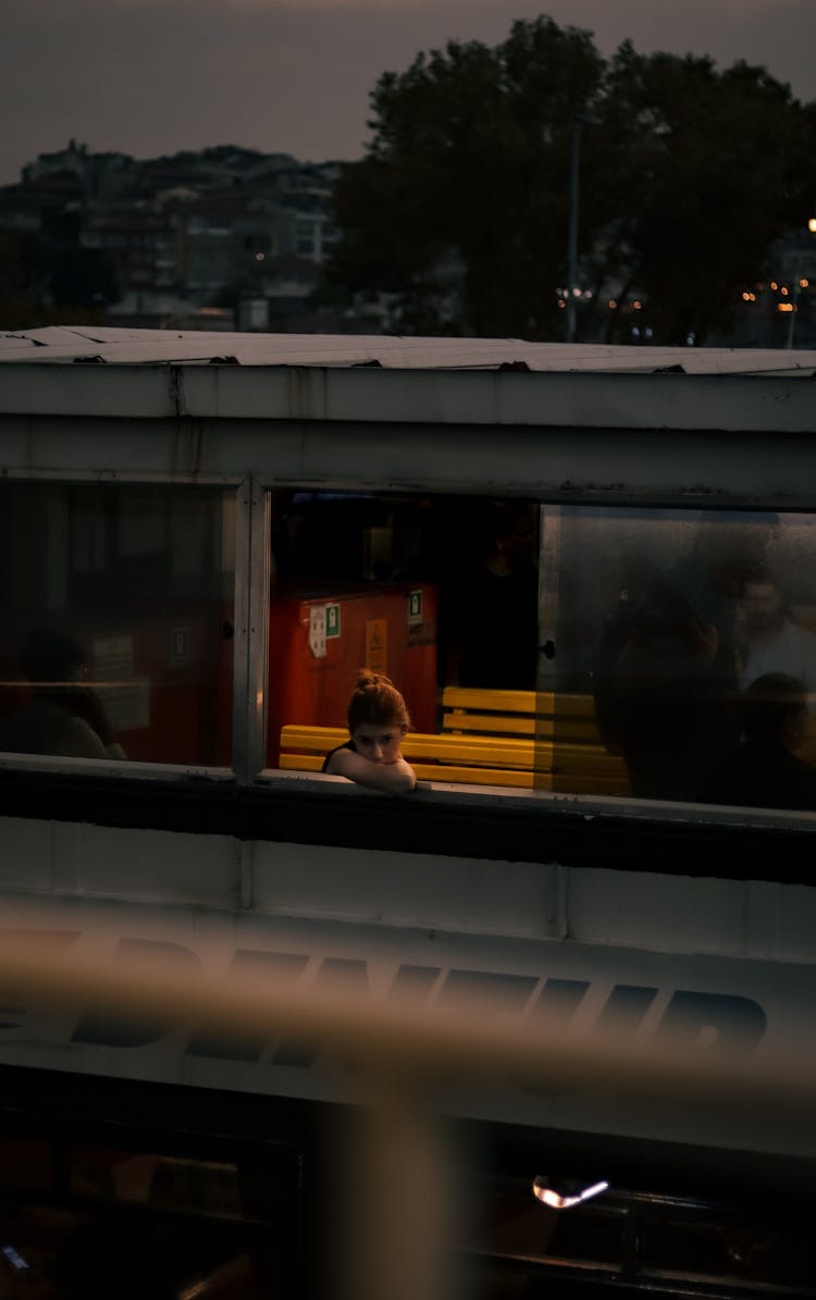 Bored Young Traveler In The Waiting Room Window