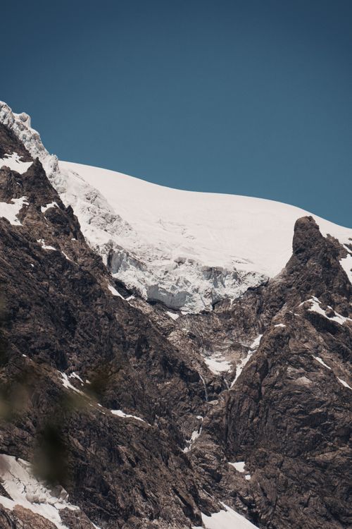 Free Breathtaking view of snowcapped peaks in Mestia, Georgia, showcasing rugged mountain beauty. Stock Photo