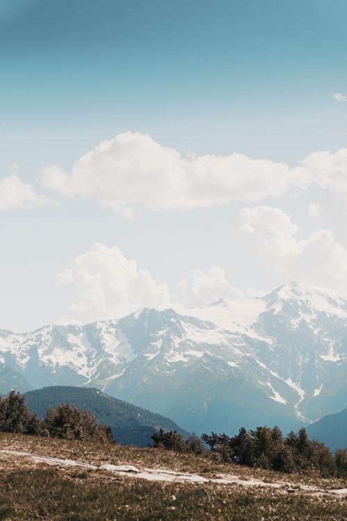 Free Captivating mountain scenery in Mestia, Georgia, showcasing snow-capped peaks and tranquil landscape. Stock Photo
