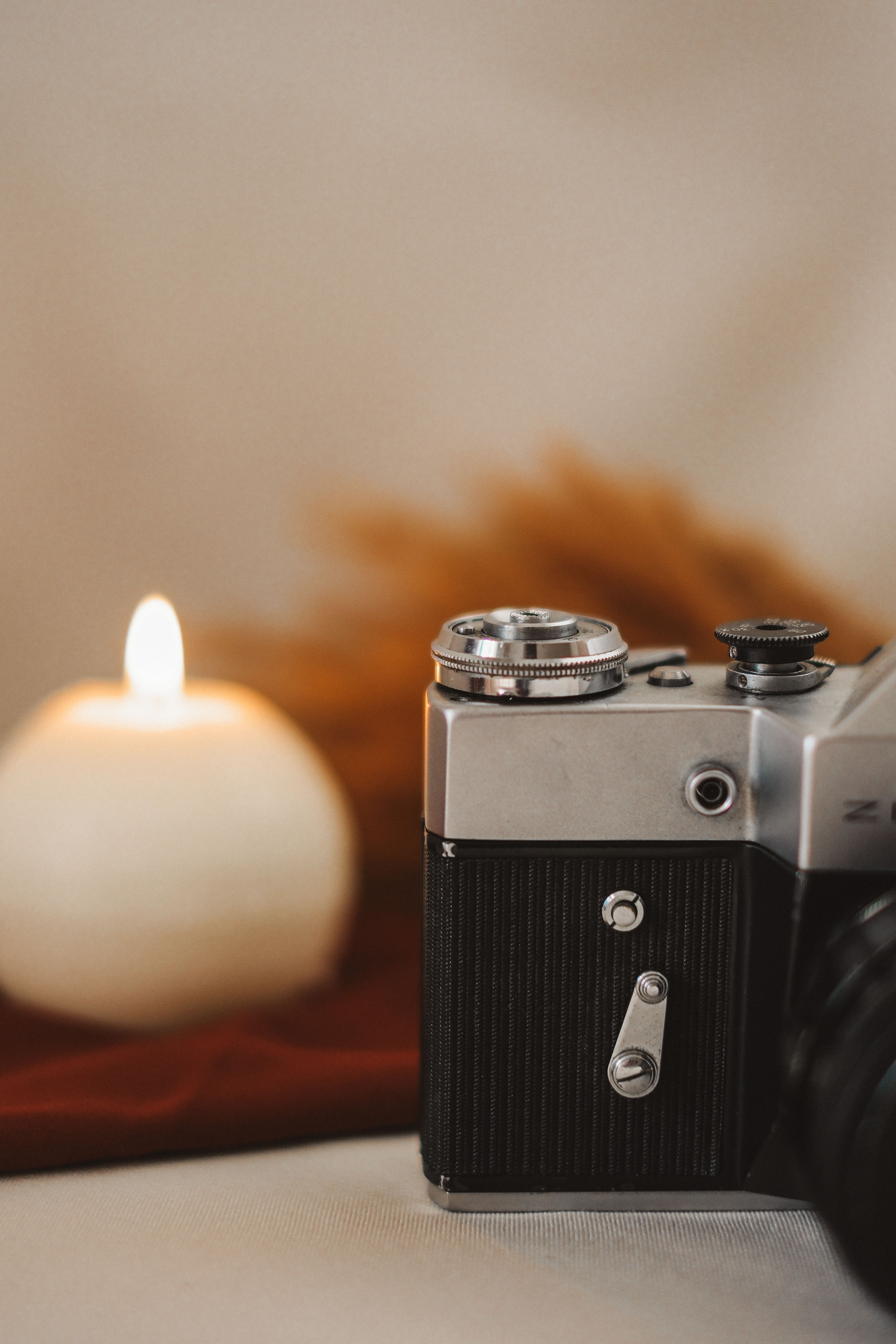 Old Camera and Candle · Free Stock Photo