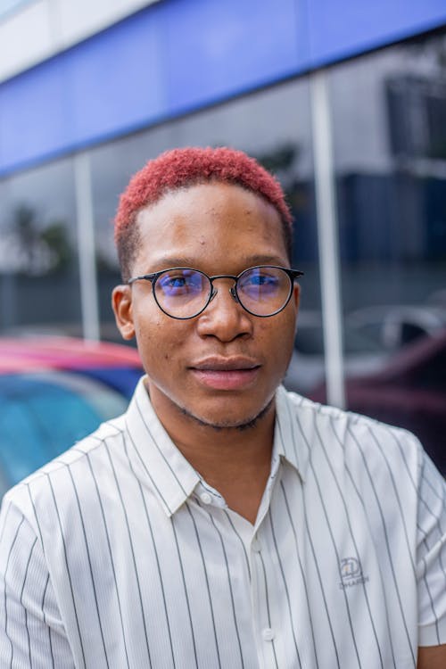 Portrait of Man in Eyeglasses and Striped Shirt