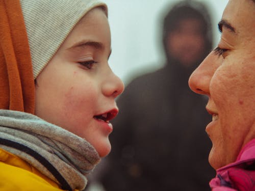 Close up of Mother and Daughter Faces