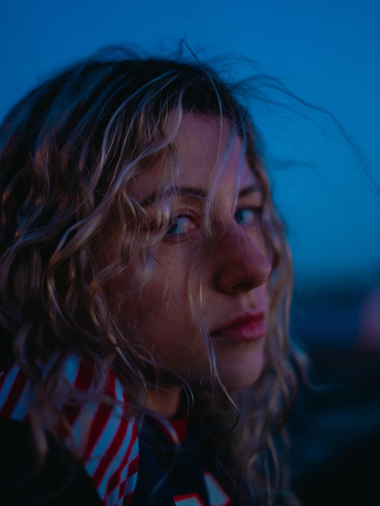 Portrait Of A Young Blonde Woman In Evening