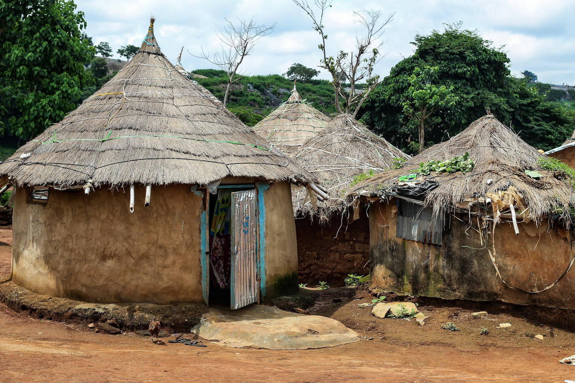 Traditional Clay Huts with Thatched Roofs