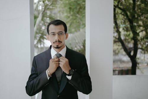 Man Wearing Suit on a Celebration