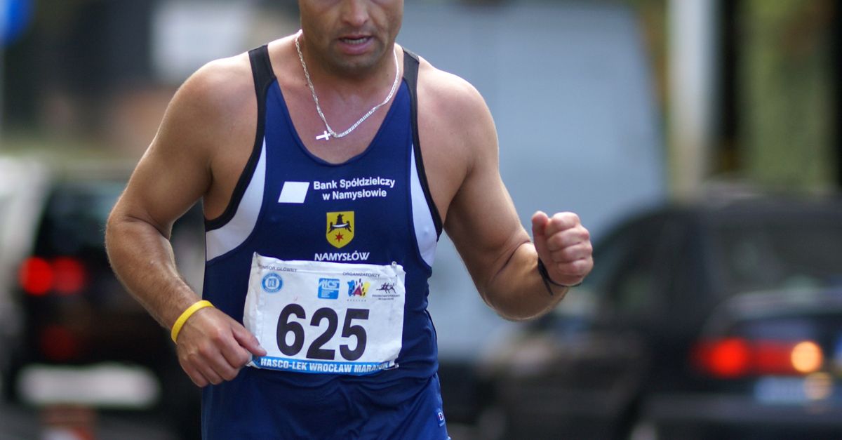 Polish Rinner Runner on Street in Poland · Free Stock Photo