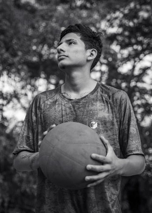 Man with Basketball Ball in Black and White