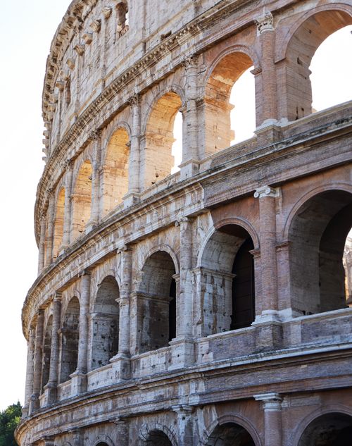 Free Historic Colosseum facade detail in Rome showcasing ancient Roman architecture. Stock Photo