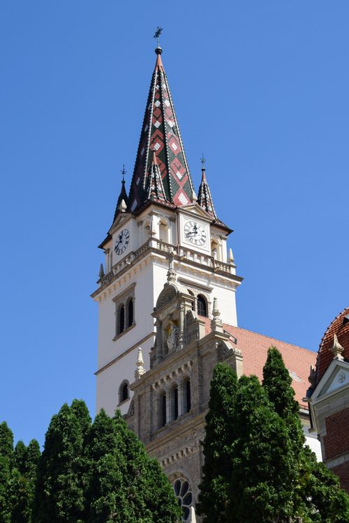 Free Beautiful church tower with intricate design and trees in Marija Bistrica, Croatia. Stock Photo