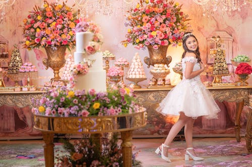 Free A Teenage Girl Posing by her Birthday Cake  Stock Photo