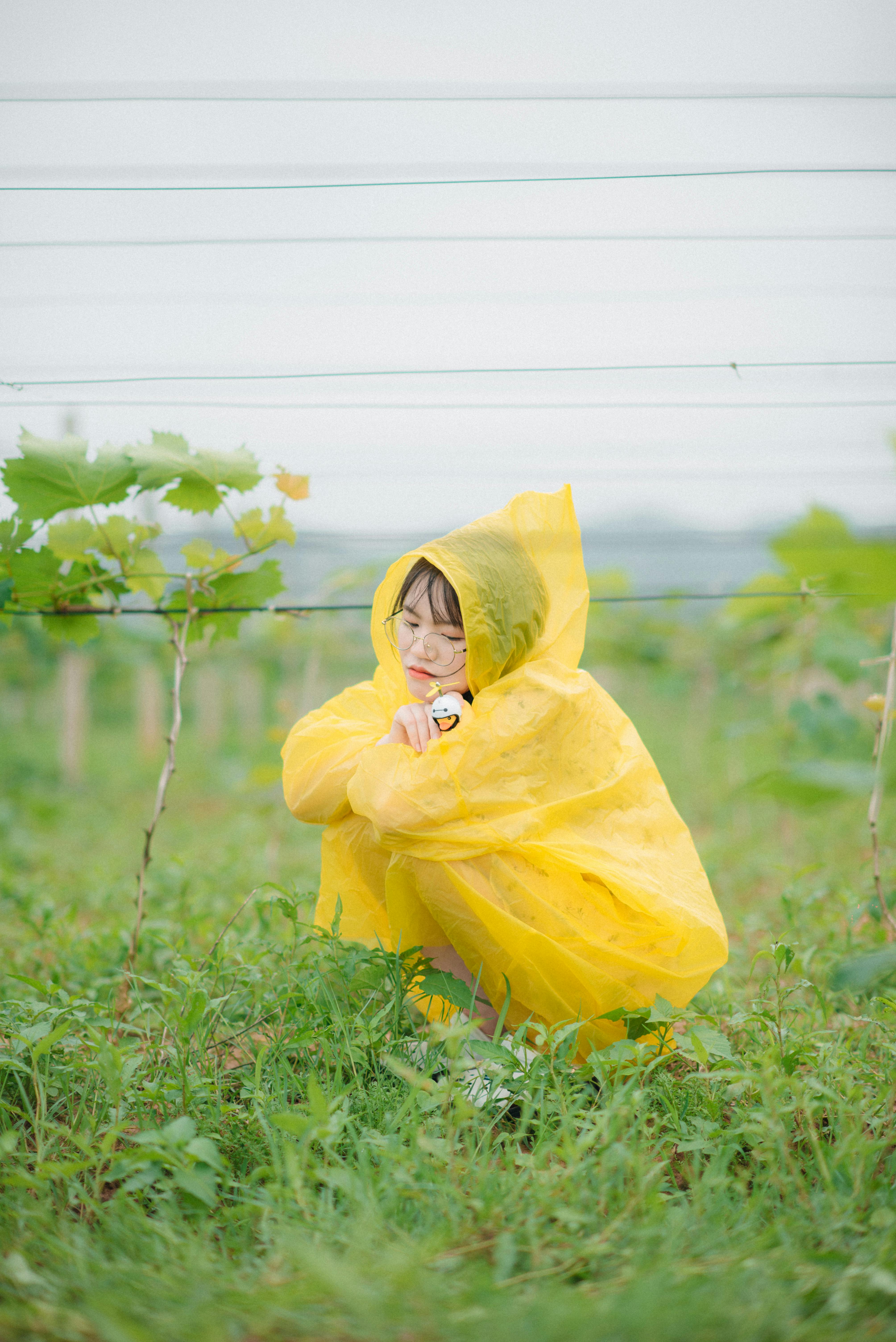 Yellow cheap plastic raincoat