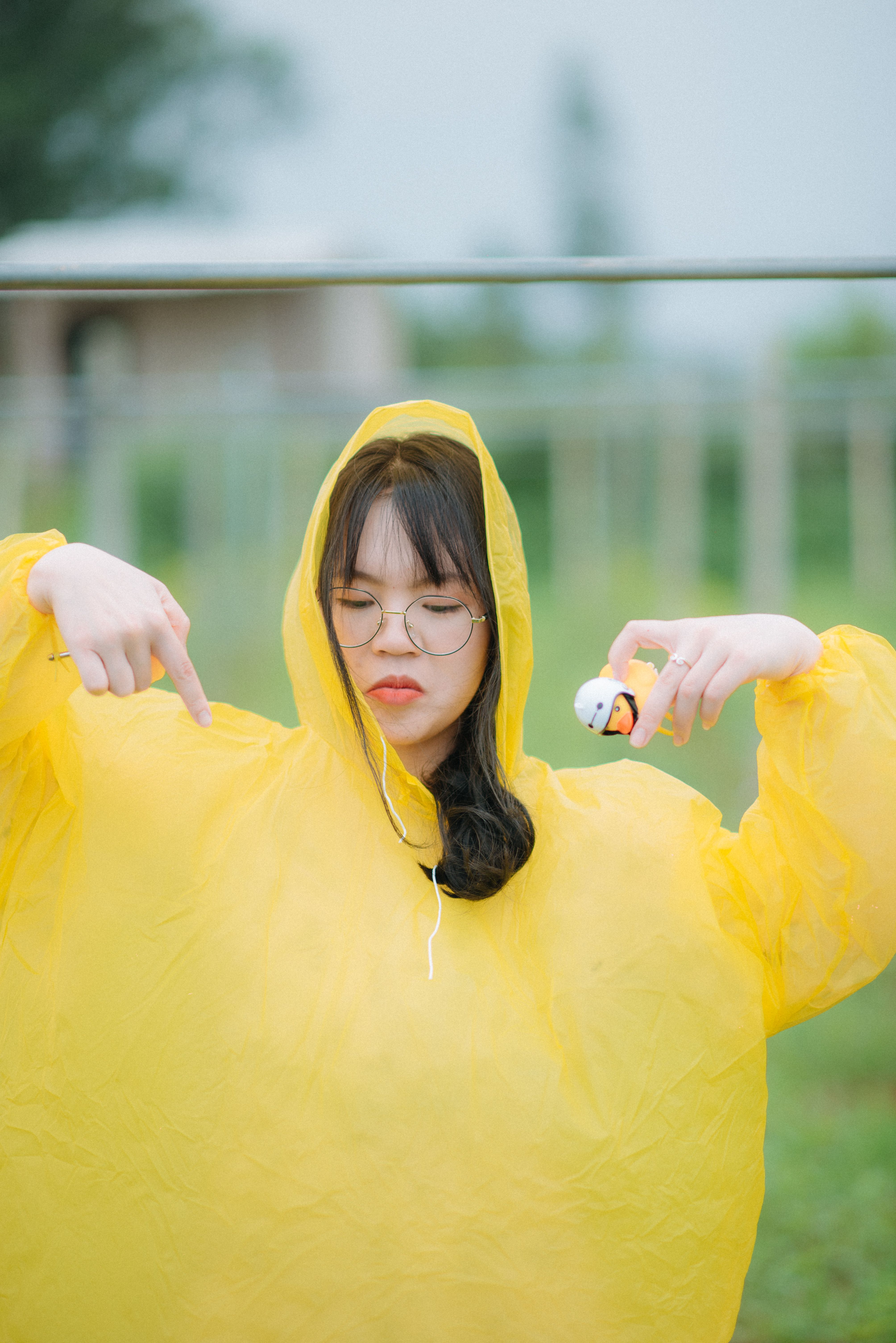 Woman in Yellow Raincoat · Free Stock Photo