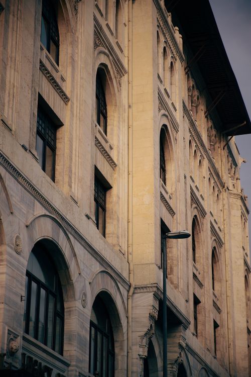Classic Architectural Facade Under Blue Sky · Free Stock Photo