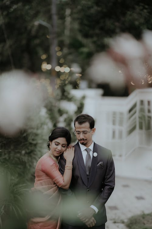 Newlyweds in Wedding Dress and Black Suit