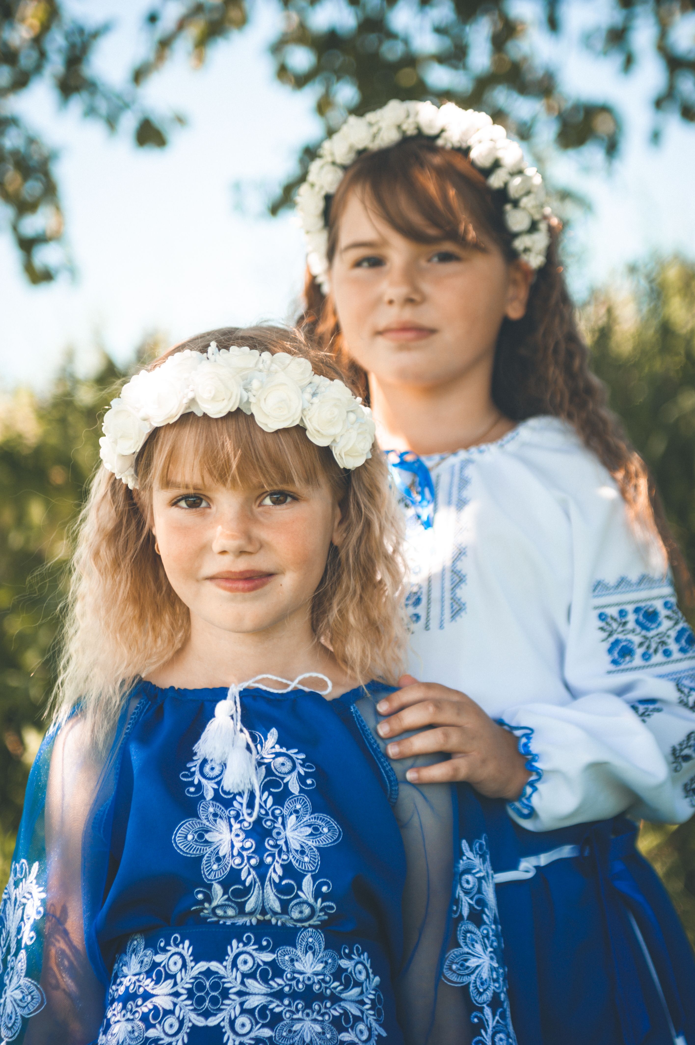 Two Little Girls Wearing Dresses and Flower Crowns · Free Stock Photo