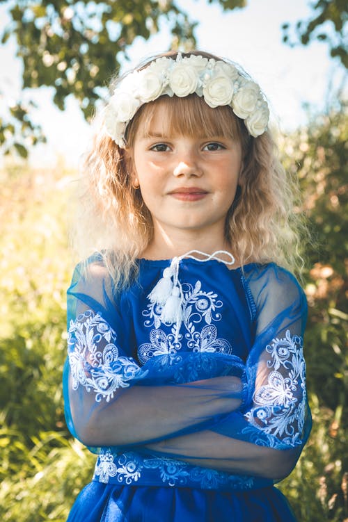 Portrait of Girl in Blue Dress