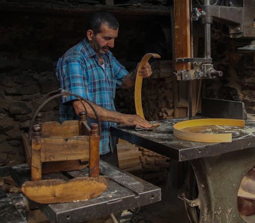 Man at the Workshop Doing Woodwork 