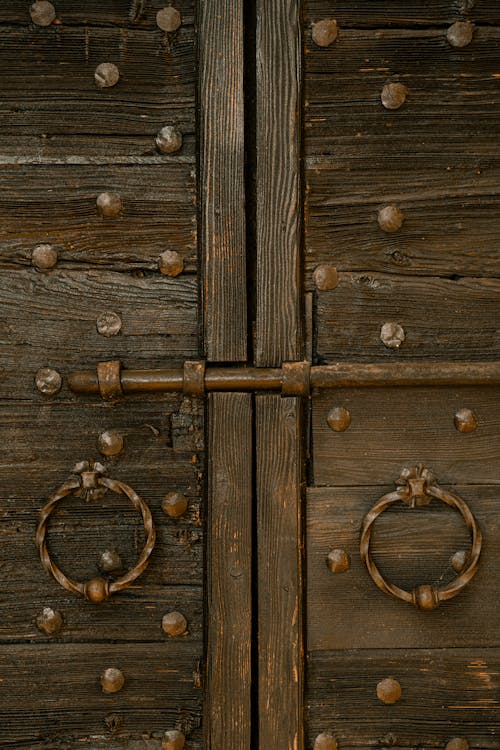 Close-up of Old Wooden Door with Metal Lock