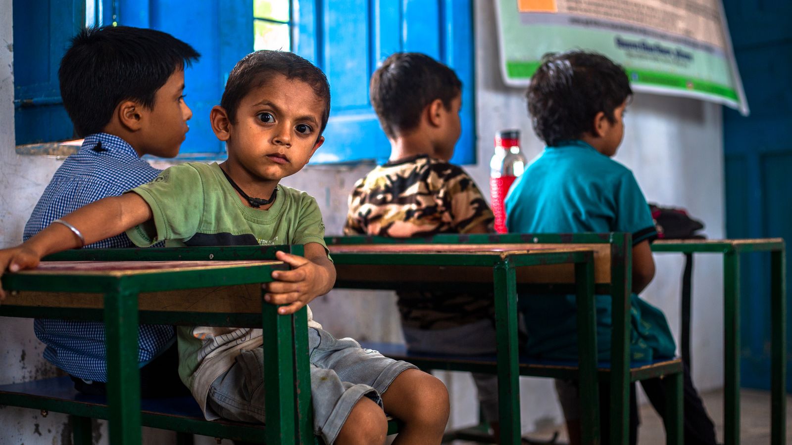 Indian children learning and interacting in a classroom