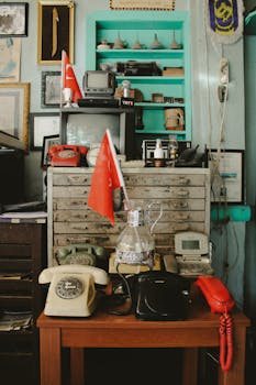 Retro collection of vintage telephones and Turkish flags in Sivrihisar.