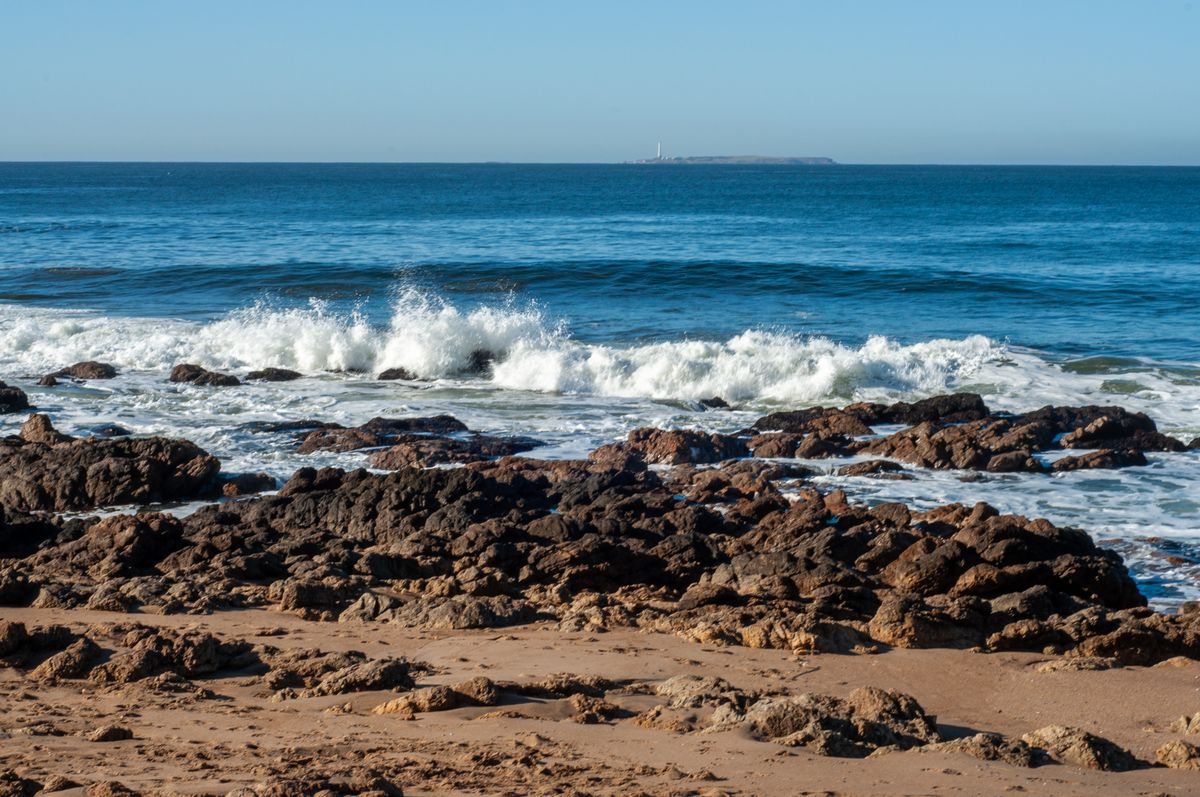 Ocean Waves Crashing on Brown Rock Formation · Free Stock Photo