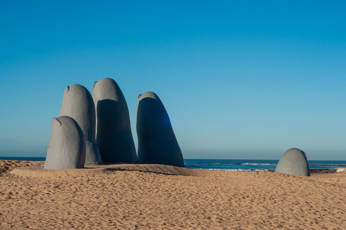 La Mano hand sculpture emerging from the sand at Punta del Este