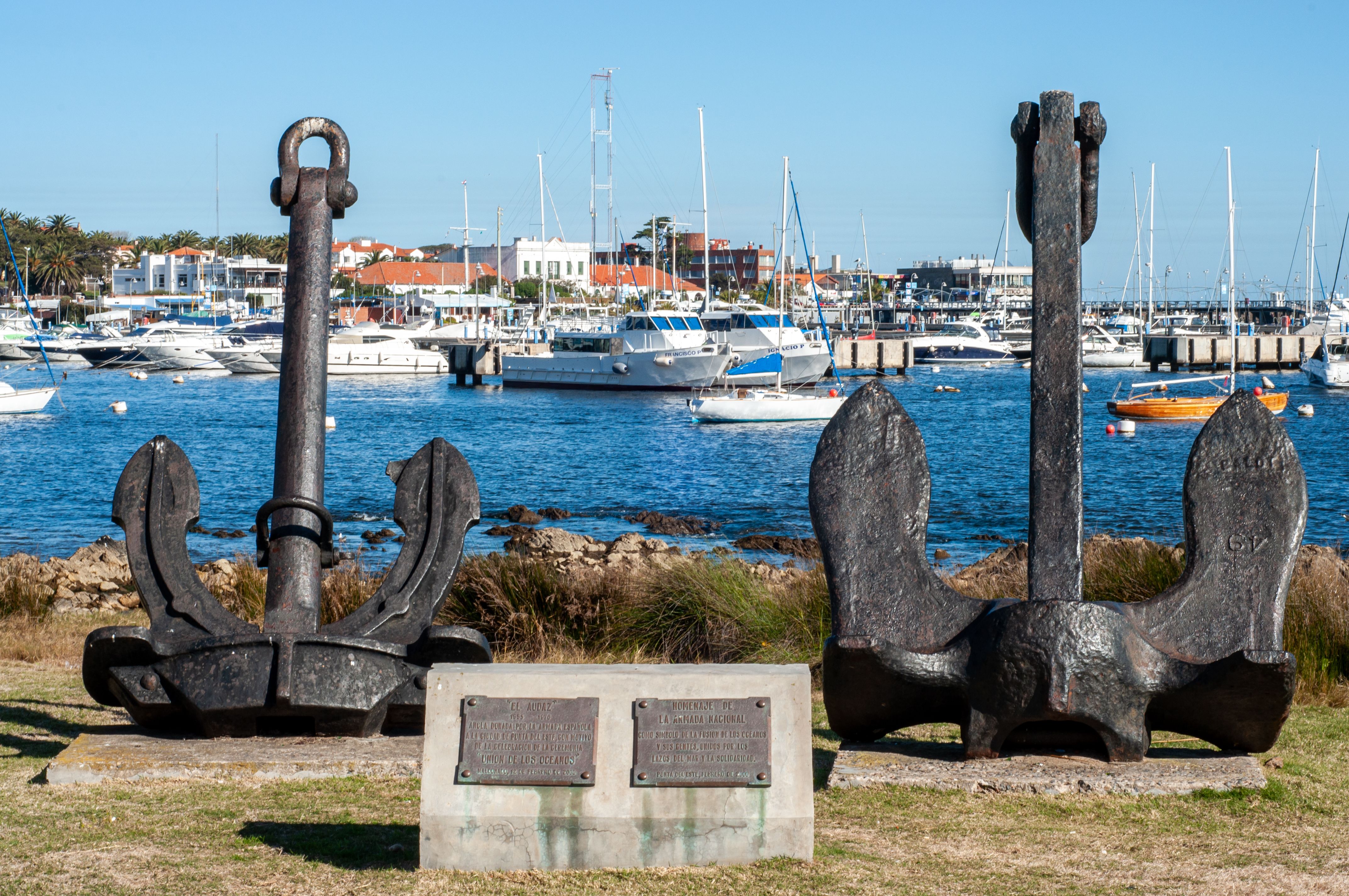 Cast iron anchors overlooking boats in Punta del Este harbor, Uruguay.