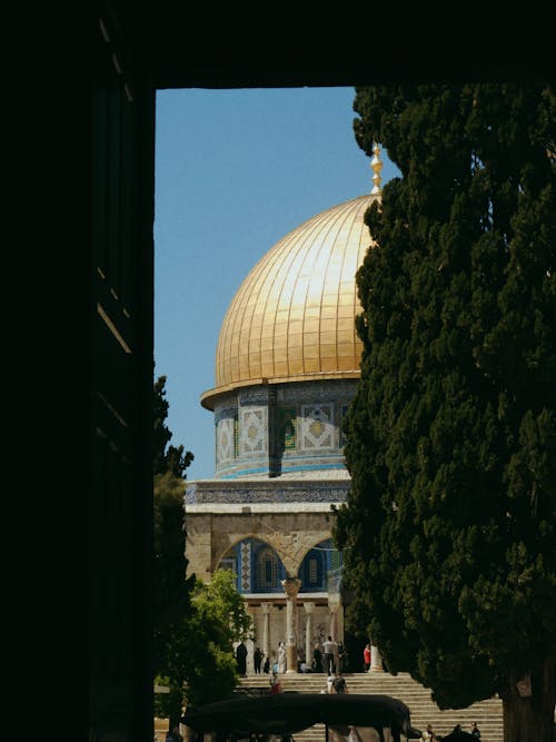 View of Dome of the Rock in Jerusalem, Israel Hidden Behind a Tree and an Entrance