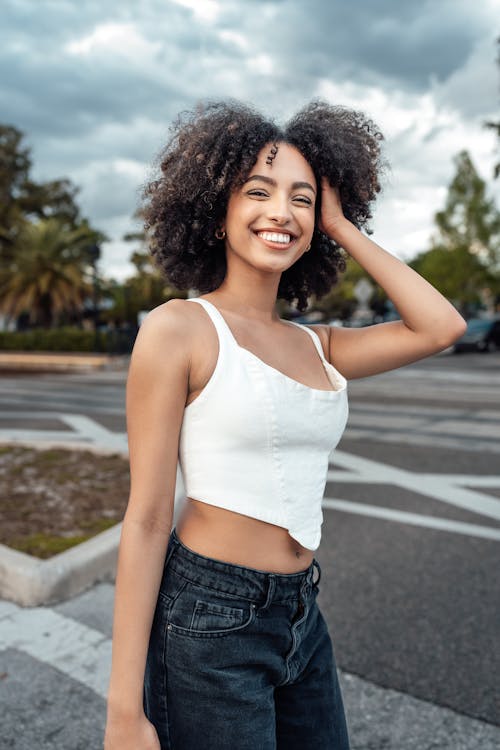 Smiling Woman with Curly Hair