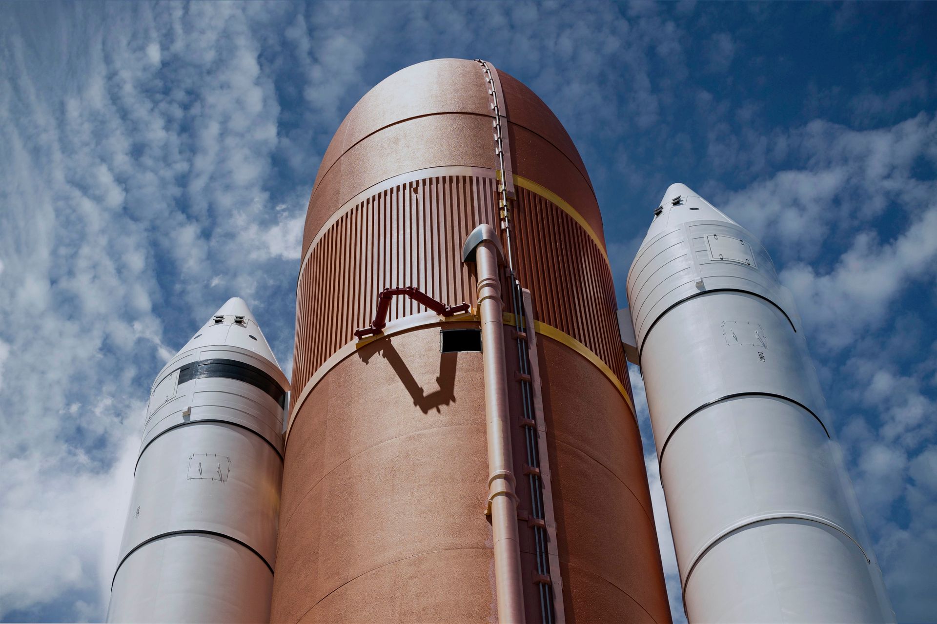 Rocket launching into the sky leaving an exhaust trail