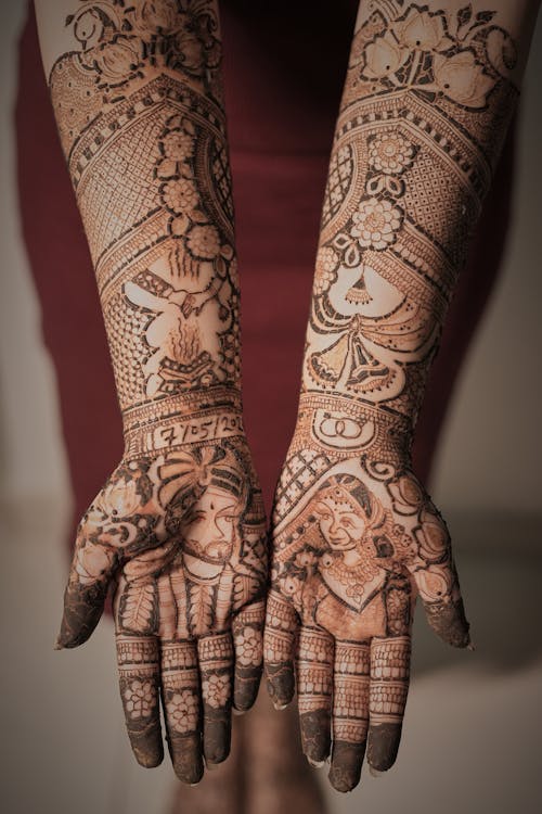 Henna Tattoos on Woman Hands