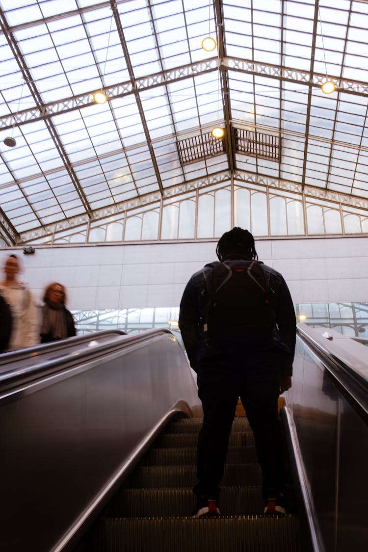 Man On Escalator