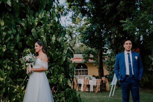 Smiling Newlyweds Standing and Posing