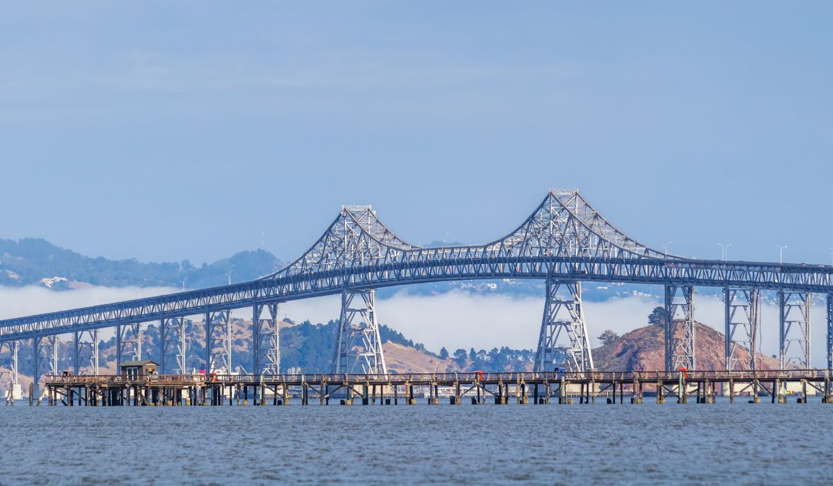 The Richmond-San Rafael Bridge spanning San Francisco Bay under a clear blue sky