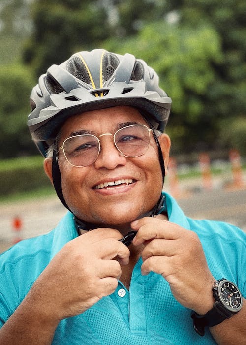 Smiling Man Wearing Cycling Helmet