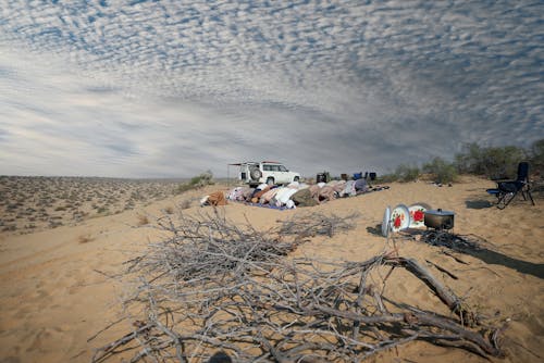 Group Praying on Desert