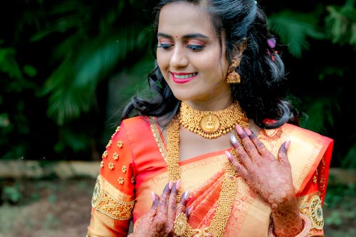 Portrait of Woman Wearing Orange Sari 