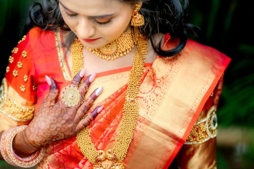 Portrait of Woman Wearing Orange Sari 