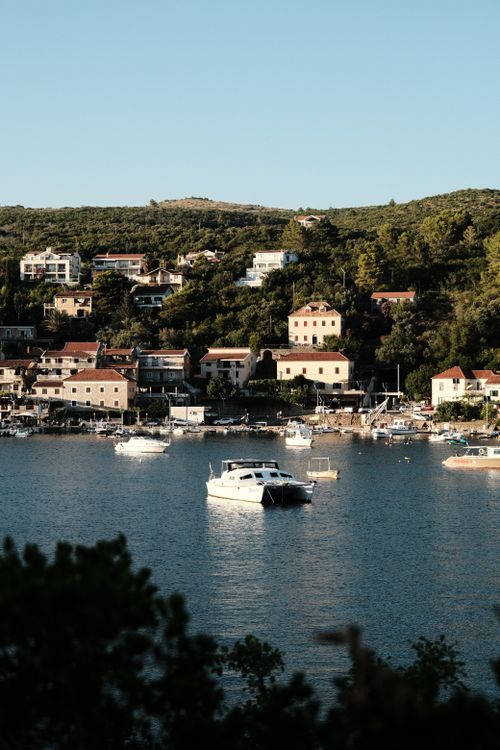 Free Charming view of Bigova's marina with boats and coastal houses in Montenegro. Stock Photo