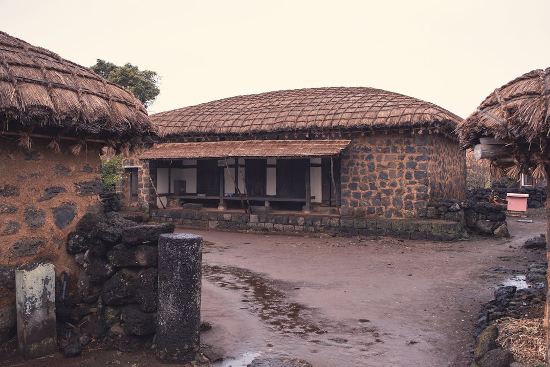 Stone Houses with Thatched Roofs