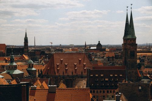 Free Explore the historic skyline of Nuremberg with its stunning Gothic architecture and church towers. Stock Photo