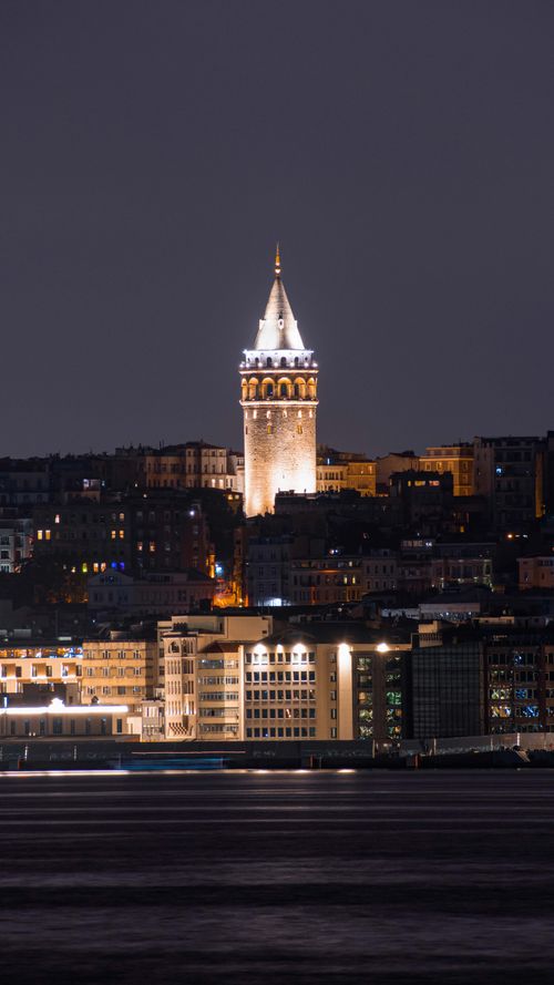 Free Scenic view of Galata Tower and Istanbul skyline at night, featuring historic architecture. Stock Photo