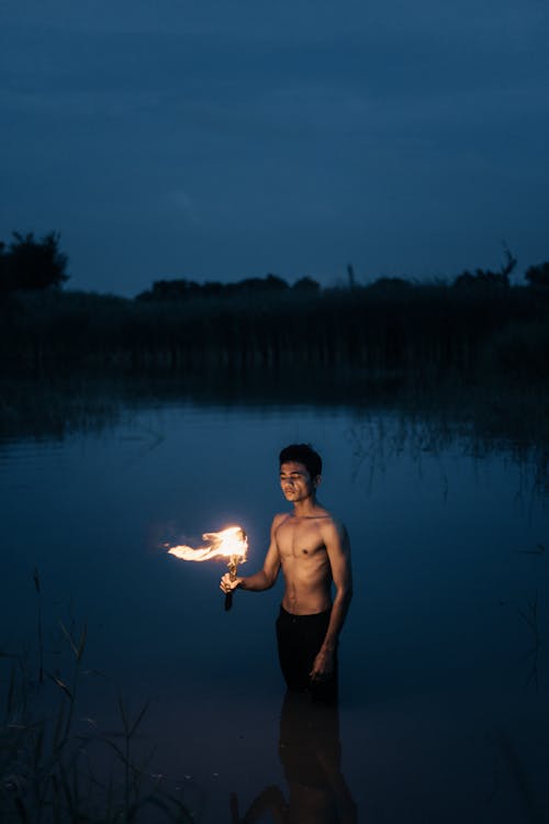 Topless Man with Torch 