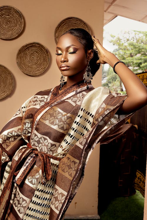 Female Model Wearing a Brown Poncho