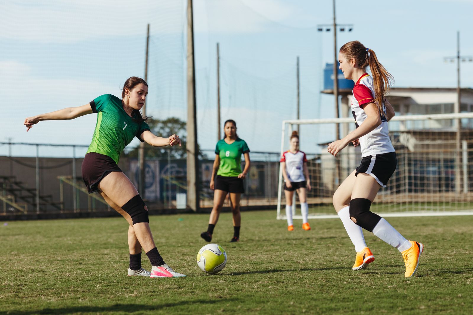 Women players pressing for the ball in training
