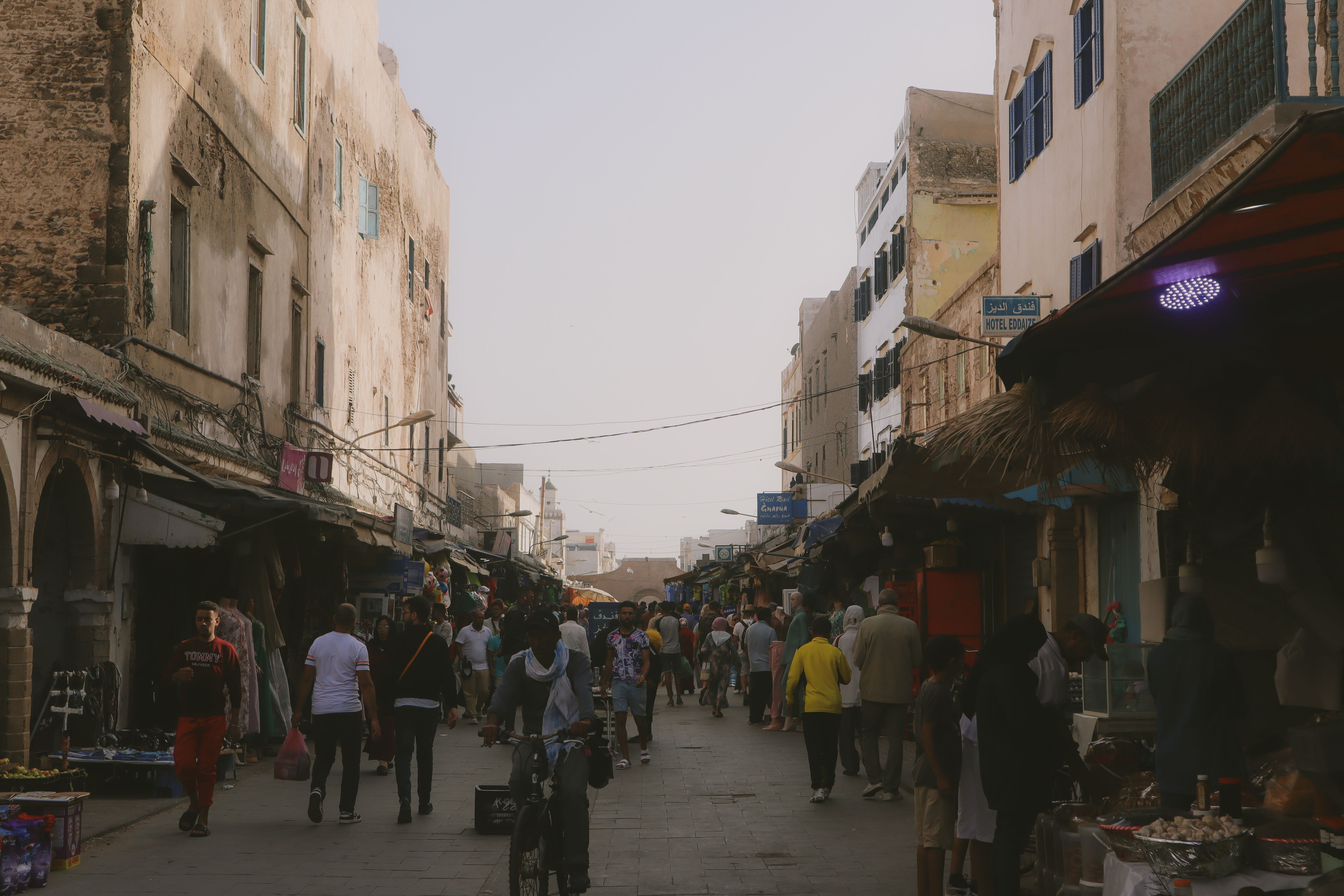 Vibrant market scene in Morocco showcasing local culture and visitors